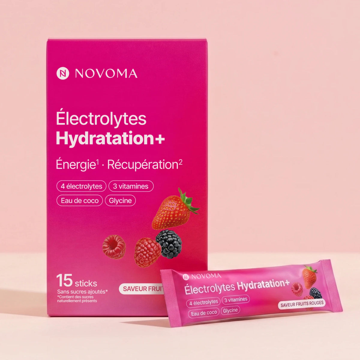Électrolytes novoma fruits rouge sur fond rose 