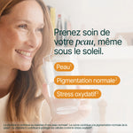 Femme souriante au soleil : prenez soin de votre peau, même sous le soleil