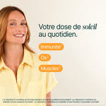 Femme souriante en haut jaune : votre dose de soleil au quotidien, immunité, os et muscles
